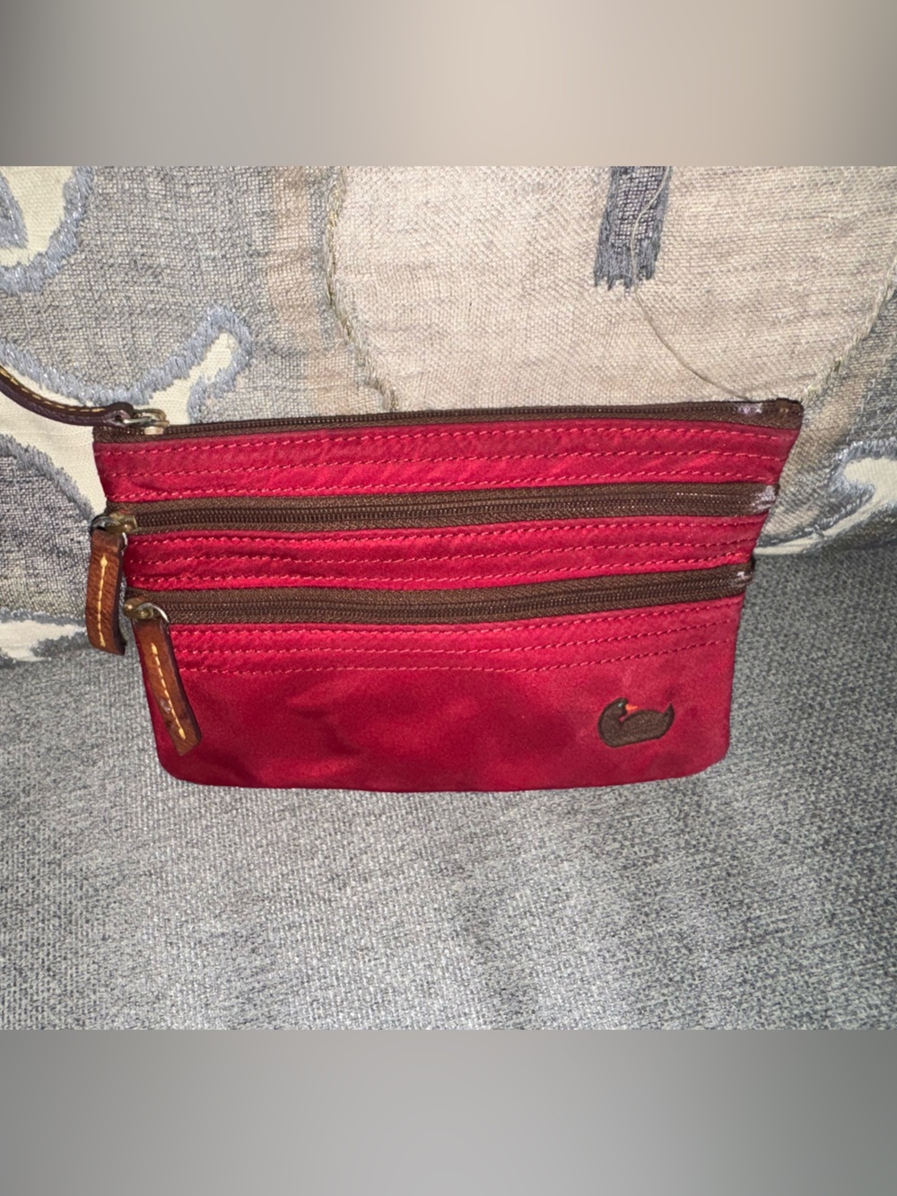 Red Nylon Triple-Zip Dooney & Bourke clutch brown/hot pink accents